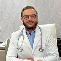 Dr. Jean Carlo Adams